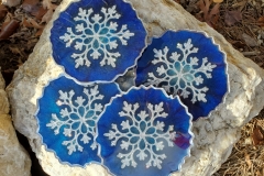 Set of 4 Snowflake Resin Coasters blue Background